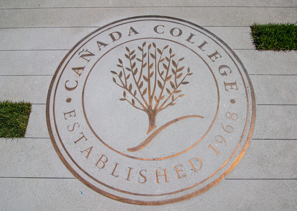 1/4" flat cut solid bronze logo and lettering Vertical Brushed finish no clear coat. Canada College Lettering installed in concrete walkways or 'faceup' voids all materials warranties