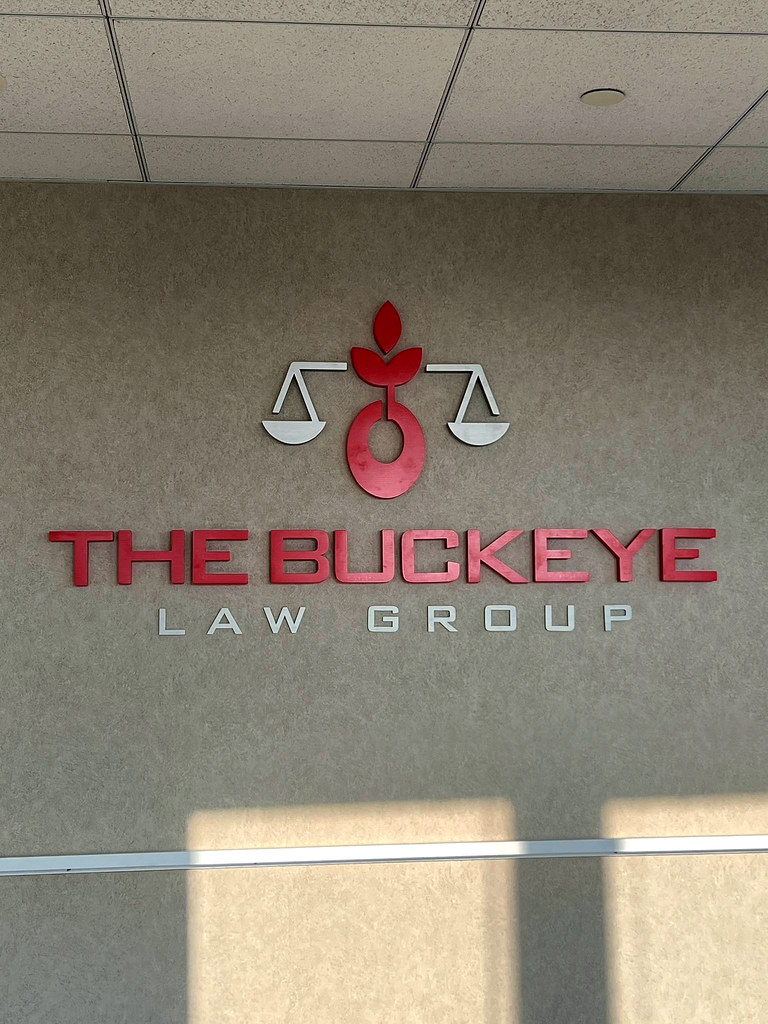 60" wide 1" thick fabricated stainless steel logo & lettering brushed finish and custom color painted