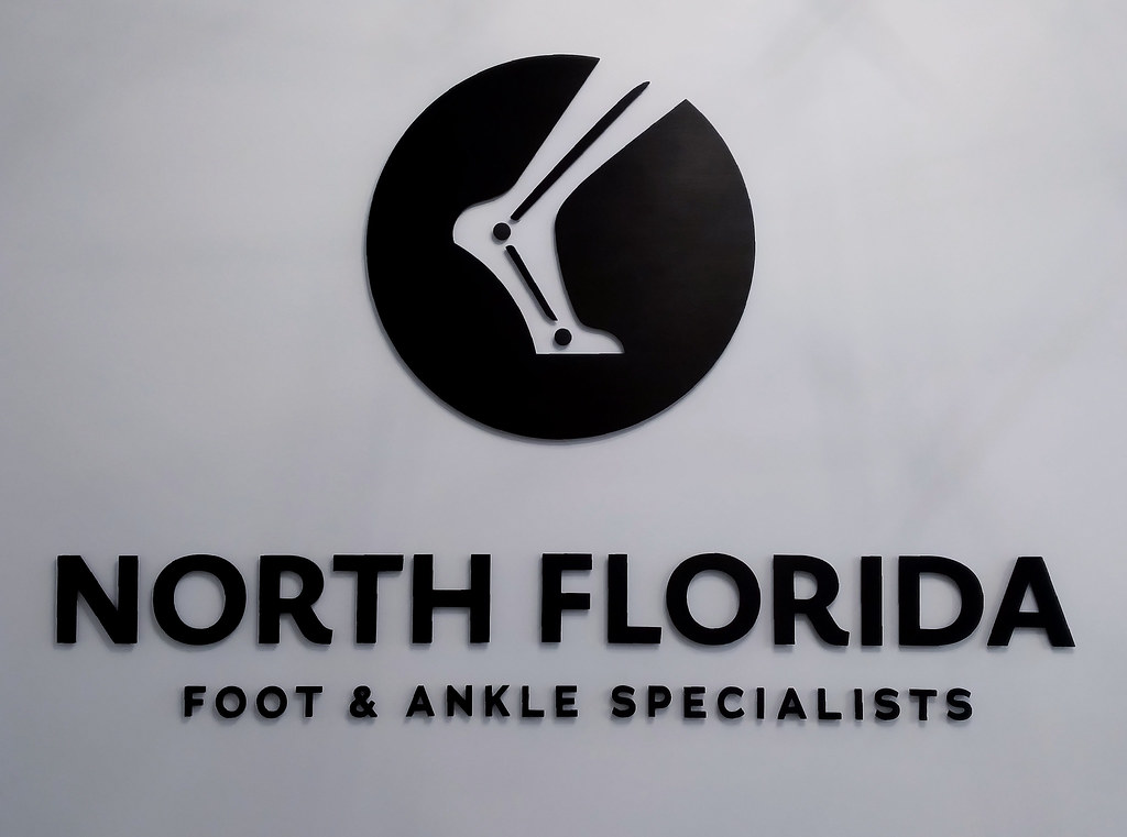 60in wide 1/4" thick solid aluminum black anodized brushed finish logo and text medical office logo sign