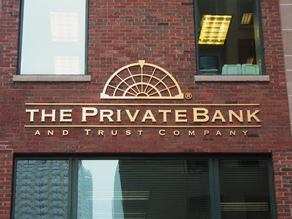 bronze logo sign