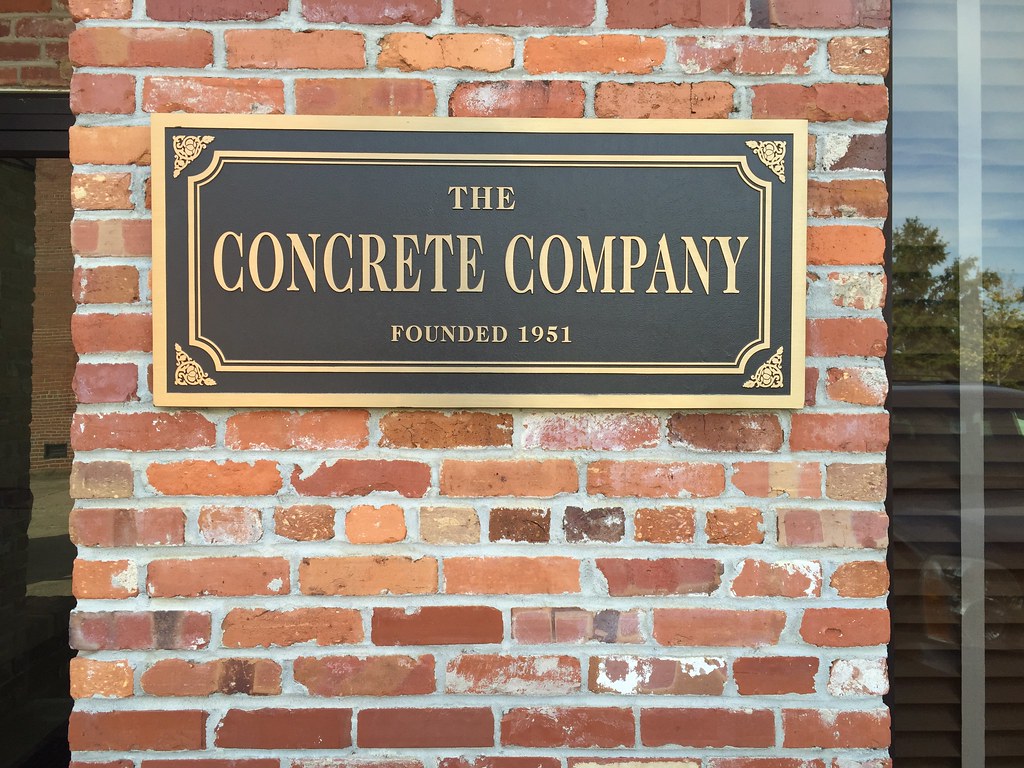 Bronze plaque with decorative accents