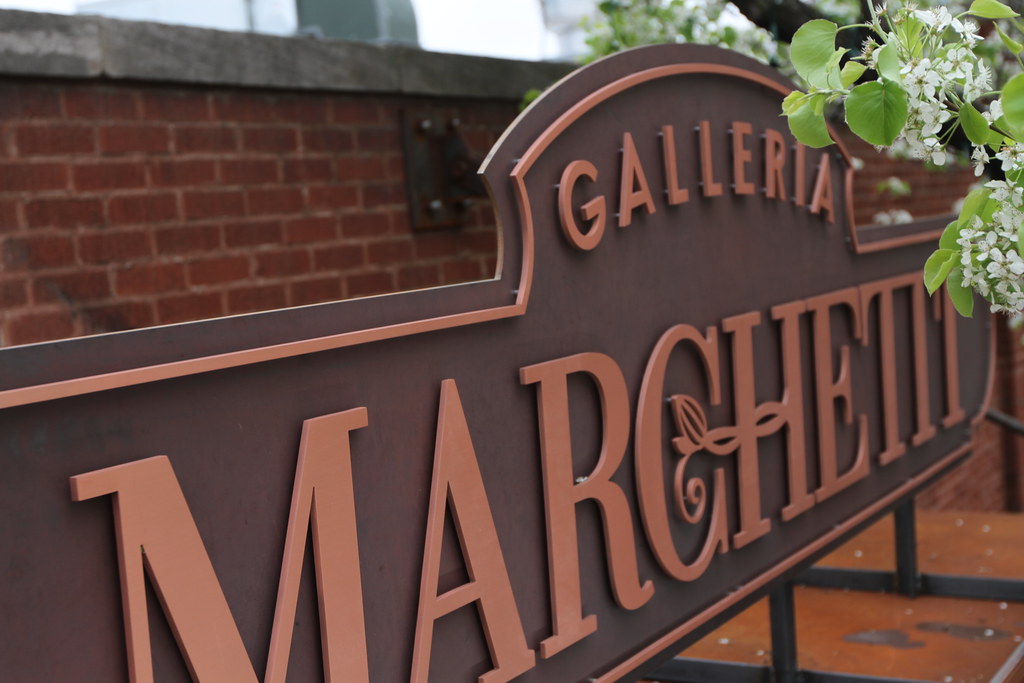 Cut metal letters assembled with standoffs on solid corten steel custom shape panel customer to install freestanding on own system