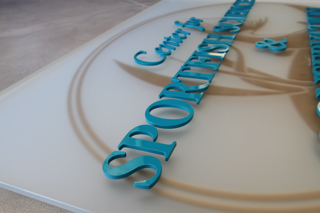 DETAIL Raised Acrylic Letter on Frosted Acrylic Panel