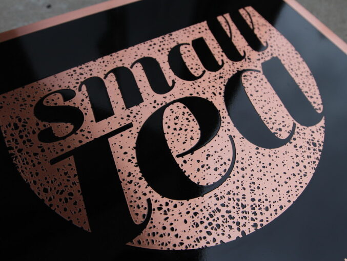 Detailed Logo Etched in Copper