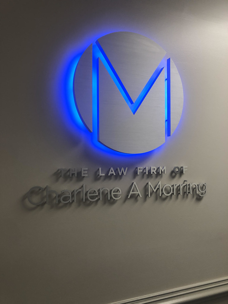 Fabricated circle panel signs with reverse cut logo graphics for lighting interior or exterior use
