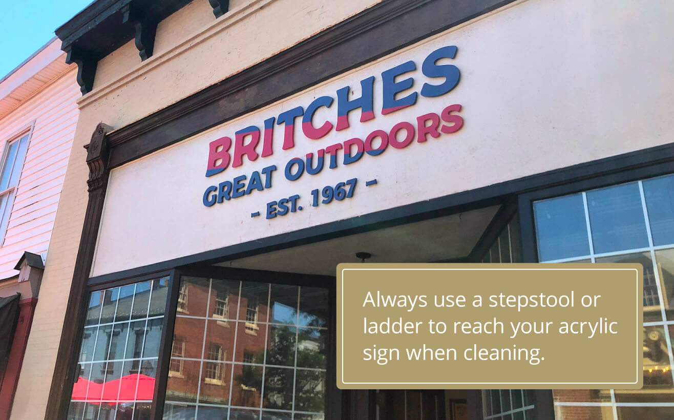 An outdoor acrylic logo sign with the tip to always use a stepstool or ladder to reach your acrylic sign when cleaning.