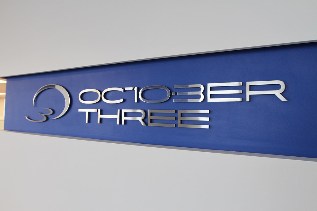 Polished Stainless Steel letters and logo for interior office sign