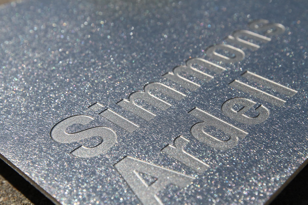 Random Orbital Etched stainless steel plaque with nopaint fill lettering