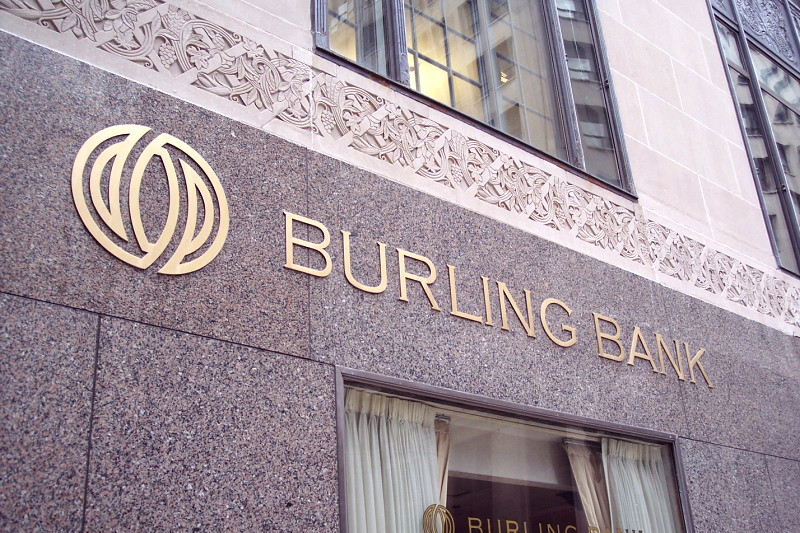 Satin Bronze letters for bank installed on granite building