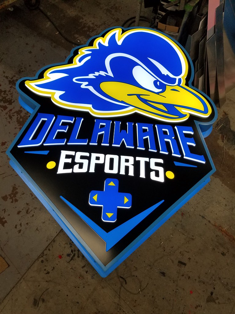 University of Delaware YouDee Esports lounge sign Lighted Lobby Sign Fabricated stainless steel panel with pushthru acrylic letters and graphics for edge lighting detail