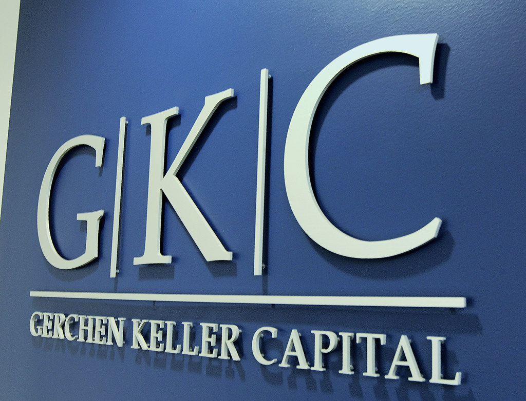 White Acrylic logo and letters with spacer mount for interior law office lobby sign